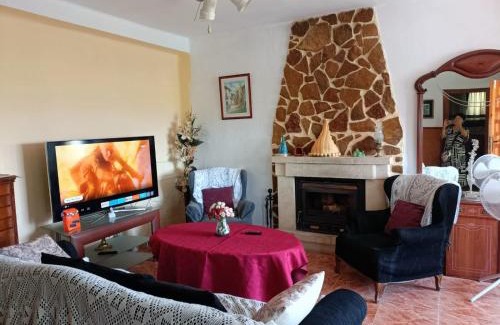 Lliria Casa | Bedroom with private bathroom and Two-Bedroom Family Suite in quiet forest country house 80m2 large swimming pool music town Lliria The garden and swimmingpool and garden are shared