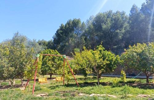 Lliria Casa | Bedroom with private bathroom One Bedroom Family Suite in forest with good view 80m2 large swimming pool in music city Lliria The garden and swimmingpool and garden are shared