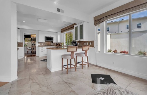 Bel Air Casa | Bel Air Tennis Villa offers serene canyon views and glimpses of the ocean.
