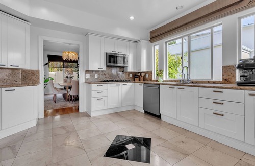 Bel Air Casa | Bel Air Tennis Villa offers serene canyon views and glimpses of the ocean.