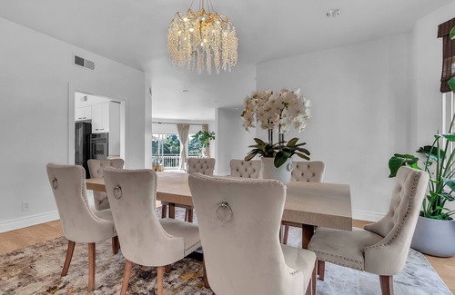 Bel Air Casa | Bel Air Tennis Villa offers serene canyon views and glimpses of the ocean.