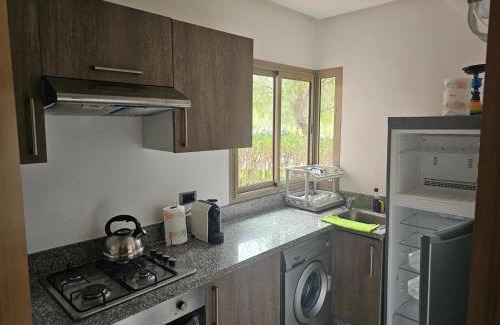 Menara Apartamento | Bel appartement avec piscine et jardin