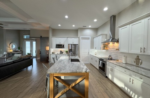 South Gulf Cove Casa | Bela-Vita-Charming 3-bedroom canal front pool home with 2 master suites