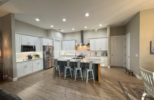 South Gulf Cove Casa | Bela-Vita-Charming 3-bedroom canal front pool home with 2 master suites