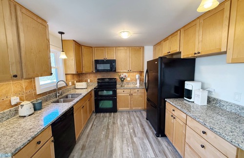 West Tisbury Casa | Beloved 5-bedroom house with Beach Passes, AC, fenced in yard, and hot tub