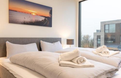Marienleuchte Apartamento | BeltBlick 22 - Stilvolle Ferienwohnung mit Sauna direkt an der Ostsee!