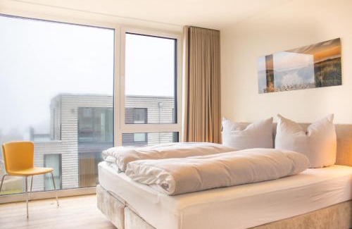 Marienleuchte Apartamento | BeltBlick 30 – Moderne Ferienwohnung mit Dachterrasse direkt an der Ostsee!
