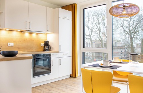 Marienleuchte Apartamento | BeltBlick 30 - roof terrace. Sauna. Sea view. Family-friendly.