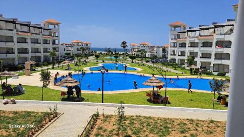 Asilah Beach Apartamento | BERALMAR RESIDENCE Privée en terrasse rez-de-jardin pied dans l'eau Chez FAOUZIA