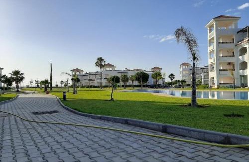 Asilah Beach Apartamento | BERALMAR RESIDENCE Privée en terrasse rez-de-jardin pied dans l'eau Chez FAOUZIA