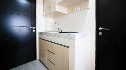 Sidoarjo Apartamento | Best Deal and Restful Studio Apartment Suncity Residence By Travelio