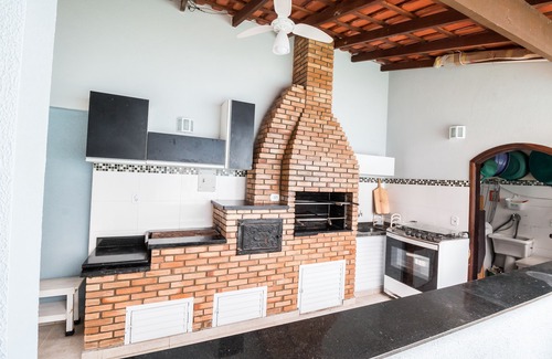 Centro Casa | La mejor ubicación en Caraguá con piscina - 5 dormitorios - Hasta 20 personas