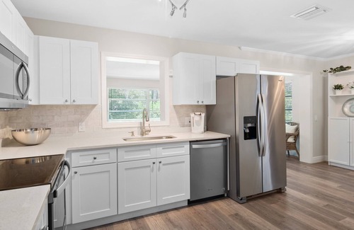 Central Naples Casa | Best Street! The BEACH is a 5 Min Drive plus Bikes, Firepit, & Fully Fenced Yard