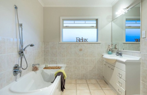 Papamoa Beach Casa | Better than a resort! Swimming pool, spa, pool-table. Walk to beach,shops,cafes.