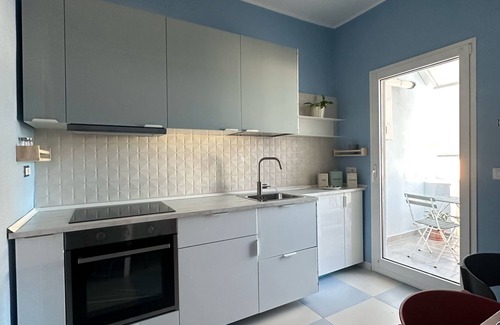 Santa Maria Apartamento | Between sea and castle. Bright, beachfront apartment. Sleeps 4