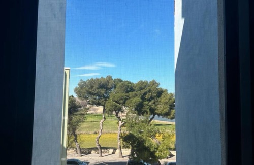 Santa Maria Apartamento | Between sea and castle. Bright, beachfront apartment. Sleeps 4