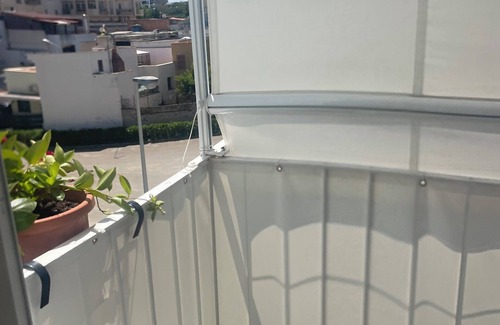 Santa Maria Apartamento | Between sea and castle. Bright, beachfront apartment. Sleeps 4