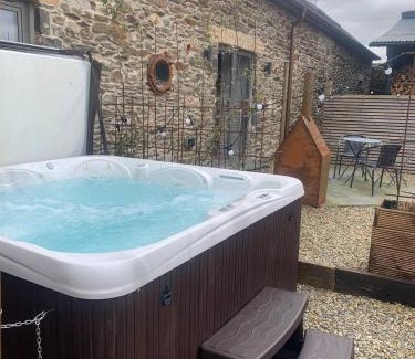 Carmarthen Casa | Beudy at Pentrecelyn - a gorgeous barn conversion with hot tub