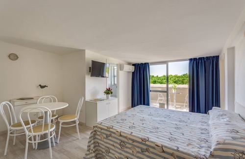 Principina a Mare Apartamento | MÁS ALLÁ DE APARTAMENTOS MAR - MONOLOCAL PANORÁMICA