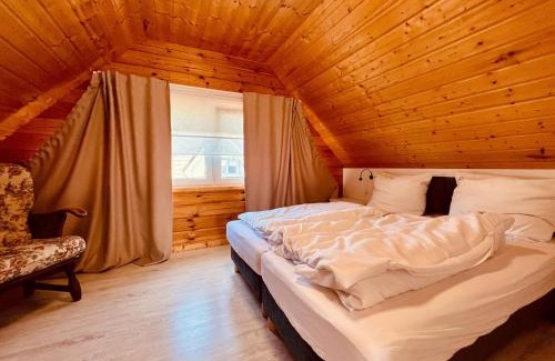 Rewal Cabina | Biale Domki Paula Rewal - Domki z klimatyzacja, w obiekcie Jacuzzi i darmowe Wifi!