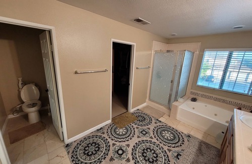 Eastvale Casa | Big Master bedroom with own bathroom toilet and wardrobe