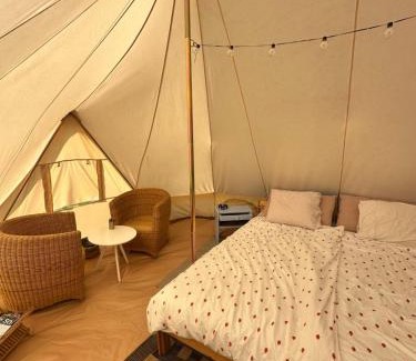 Stege Otro | Big tent with real beds and ocean view