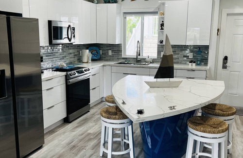 Alice Town Condominio | Bimini World Resorts TIPSY TURTLE With Boatslip and Polaris UTV