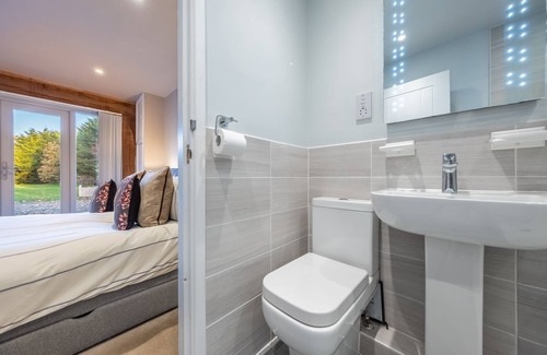 Roughton Casa | Blackberry Cottage is a modern detached upside down barn conversion with an eclectic collection of f