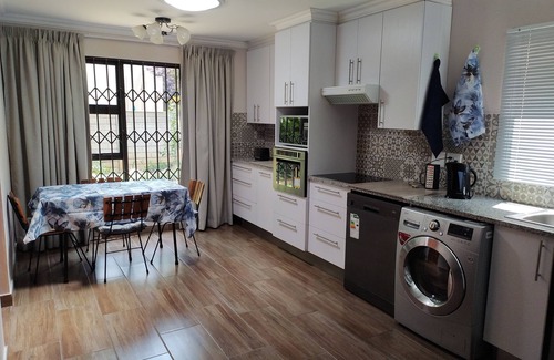 Vanderbijlpark Apartamento | BLESSING furnished apartment, fully equipped kitchen, bathroom, lounge, bedroom.