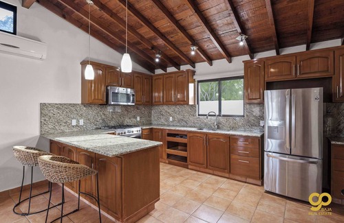El Centenario Casa | Blissful Bay Views, Steps to Beach, Private Yard