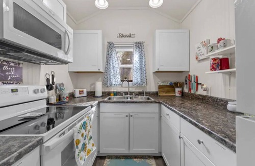 Emerald Isle Casa | Bloom Where You Are Planted Tiny House