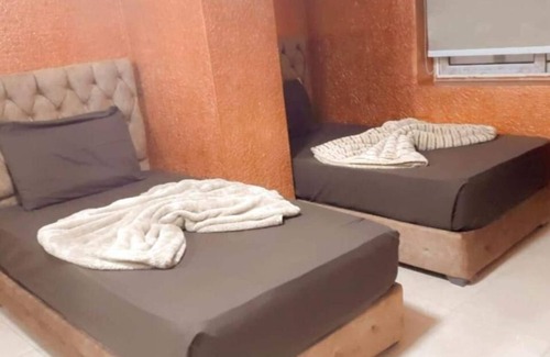 Al Duqqi Hotel | Blue Eyes Hotel