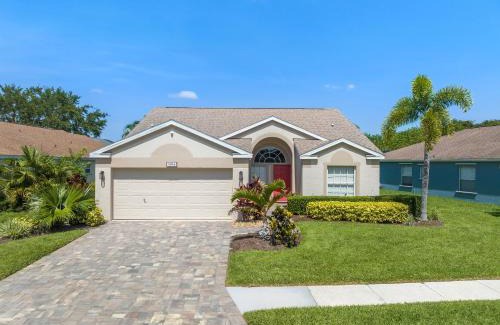 Sabal Harbour Casa | Blue Heron House! Cozy home with heated pool and pool toys! Water view out back!