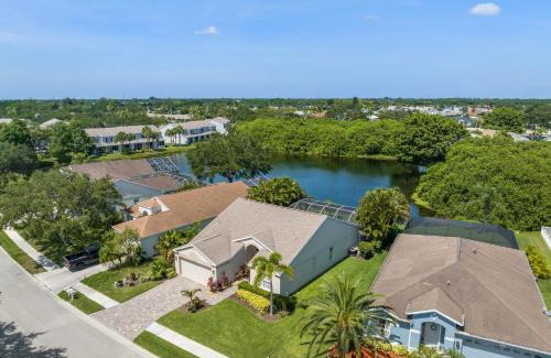 Sabal Harbour Casa | Blue Heron House! Cozy home with heated pool and pool toys! Water view out back!