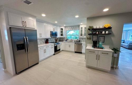 Ruskin Casa | Blue Heron House | Private 4 BR Waterfront w/ Heated Pool and Fire Pit