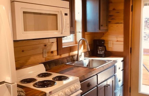 Guild Cabina | Blue Heron Treehouse bañera de hidromasaje Chattanooga 17 millas cerrada.