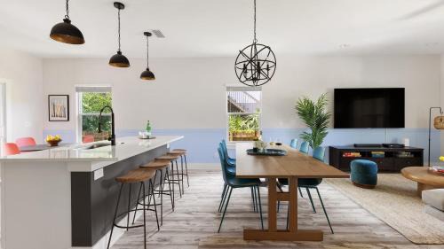 Vilano Beach Casa | Blue Hour Playfully Designed Beach Home w Hot Tub Fire Pit Game Room