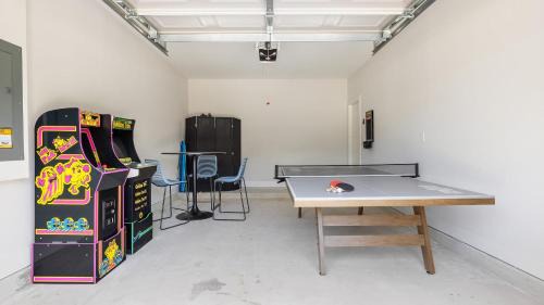 Vilano Beach Casa | Blue Hour Playfully Designed Beach Home w Hot Tub Fire Pit Game Room
