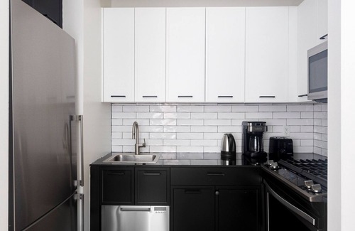 Financial District Apartamento | Blueground | Financial District, rooftop, nr Wall St.