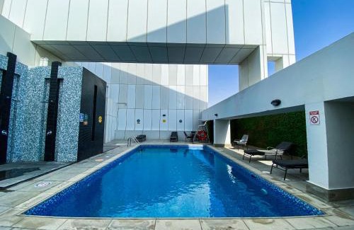 Dubai Sports City Apartamento | bnbmehomes - Elegant Studio Golf Course View - 1916