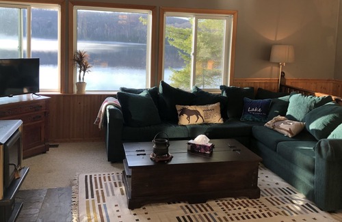 Novar Cabaña | Boathouse Cottage on the water, access to snowmobile trails and ice fishing.
