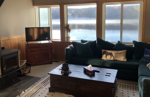 Novar Cabaña | Boathouse Cottage on the water, access to snowmobile trails and ice fishing.