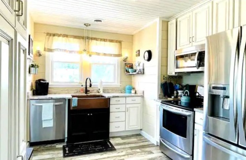 Colonial Beach Cabaña | Boaty McBeach House: A Short Walk to Beach, Waterfront Sunsets & Restaurants!