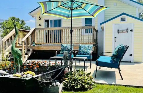 Colonial Beach Cabaña | Boaty McBeach House: A Short Walk to Beach, Waterfront Sunsets & Restaurants!
