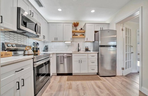 Sun Bay South Casa | Boho Oasis with Heated Pool, Billiards, Shuffleboard & More