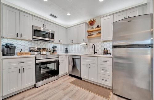Sun Bay South Casa | Boho Oasis with Heated Pool, Billiards, Shuffleboard & More