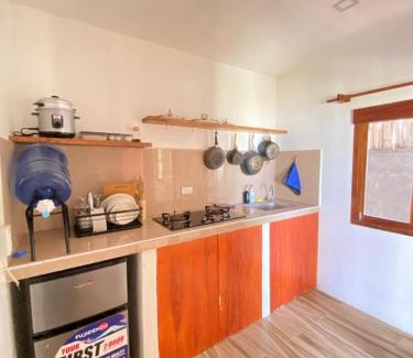 Catangnan Casa | Bonak homestay peaceful Beachfront Escape with Kitchen and AC