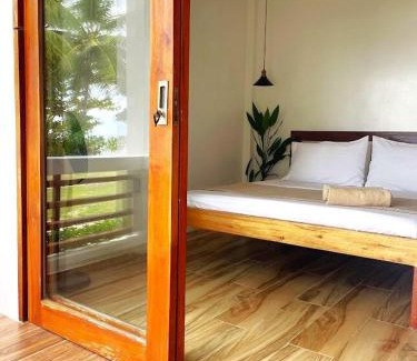 Catangnan Casa | Bonak homestay peaceful Beachfront Escape with Kitchen and AC