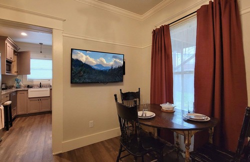 Historic Railroad District Casa | BookStayHop -RedTail Orliena Suite, Relaxing Hot tub and a Tesla Station