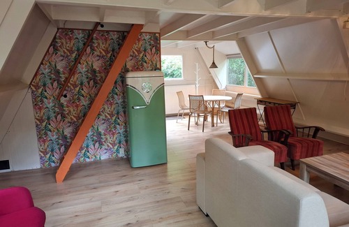 Rekem Chalet De Esquí | Bosrijk gelegen vakantiehuis met optimale privacy!